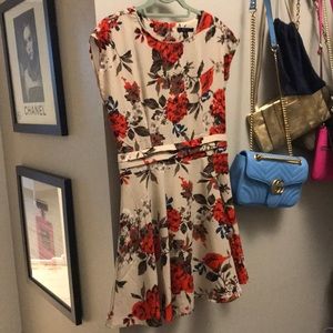 Cream, orange, blue skater dress.